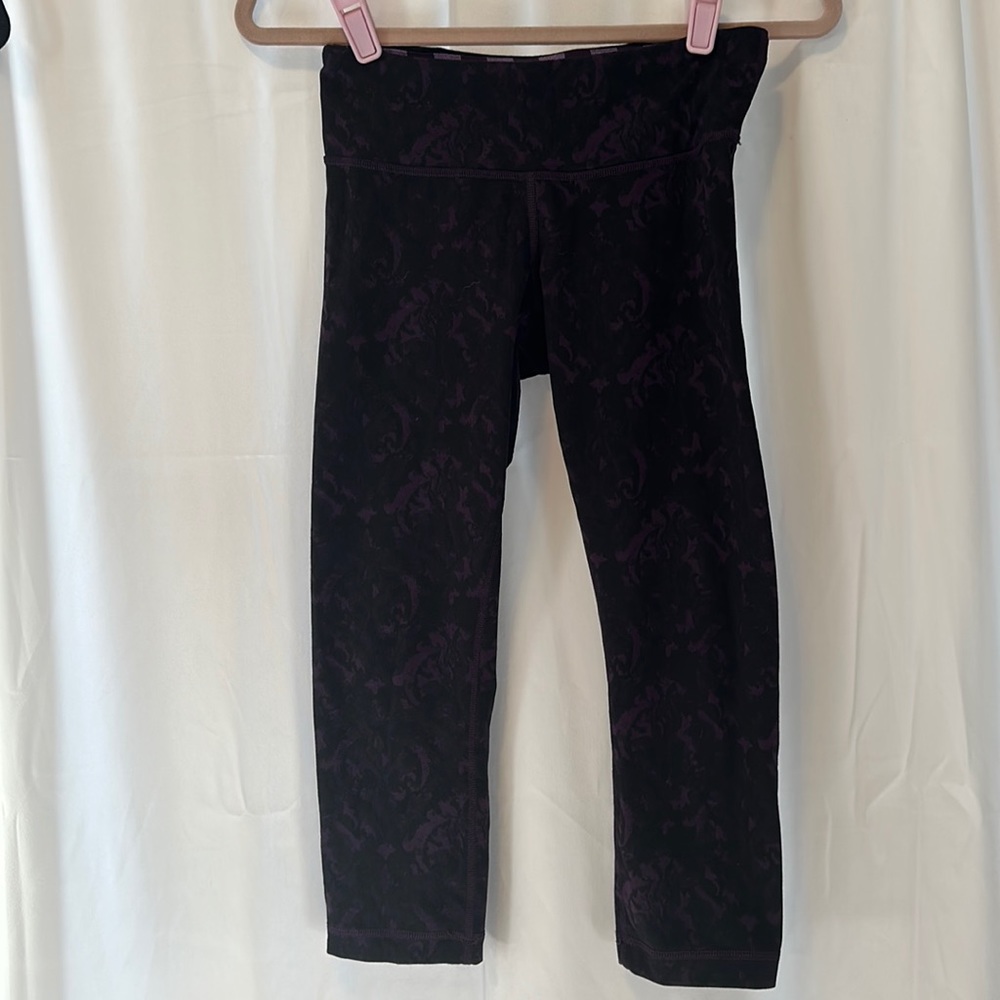 Purple Lululemon wonderunder crop yoga pants